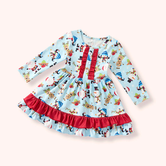Children's dress with Christmas-themed pattern on a white background