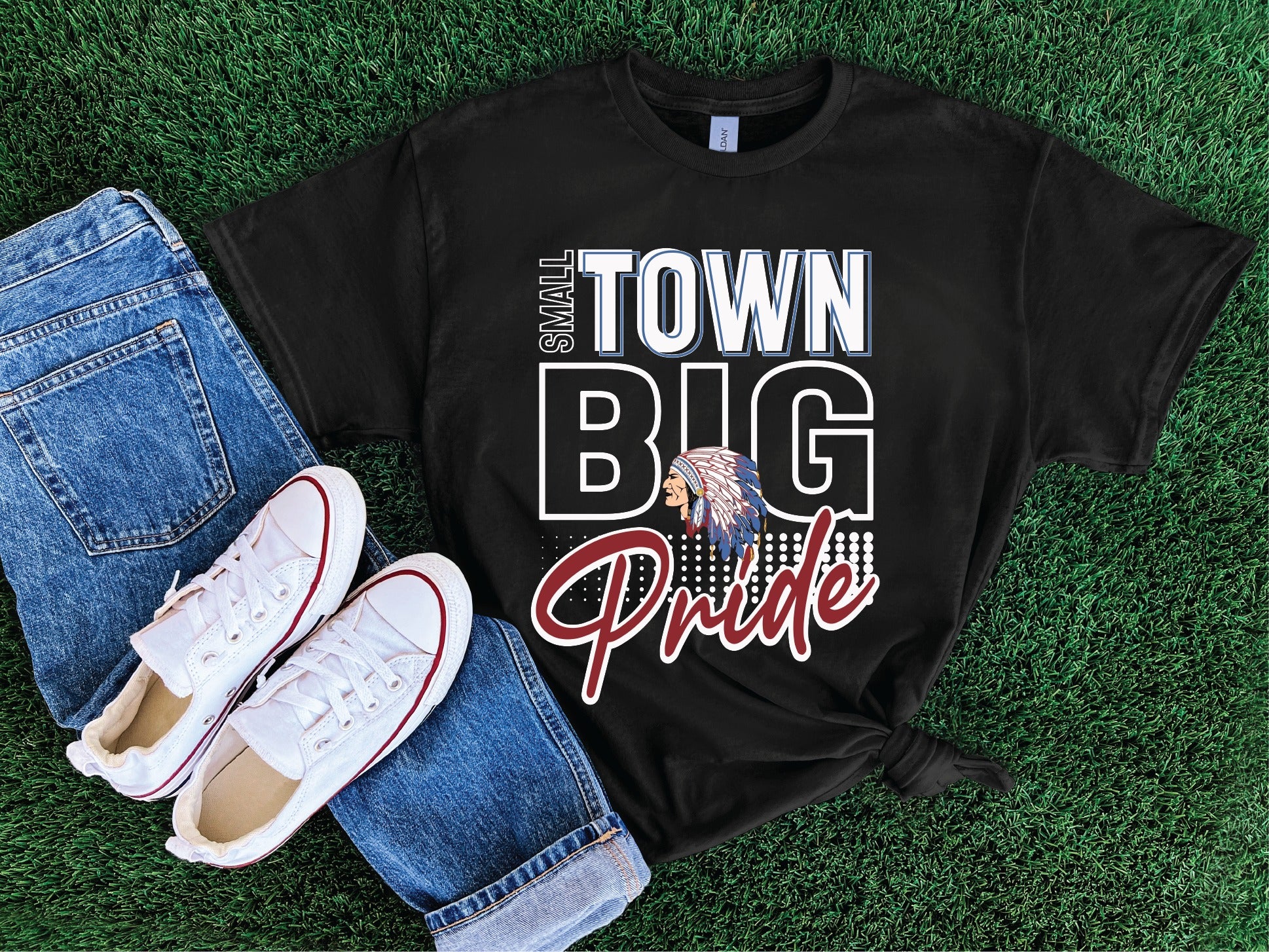 Black tee with "Small Town, Big Pride" on the front, with an indian image.