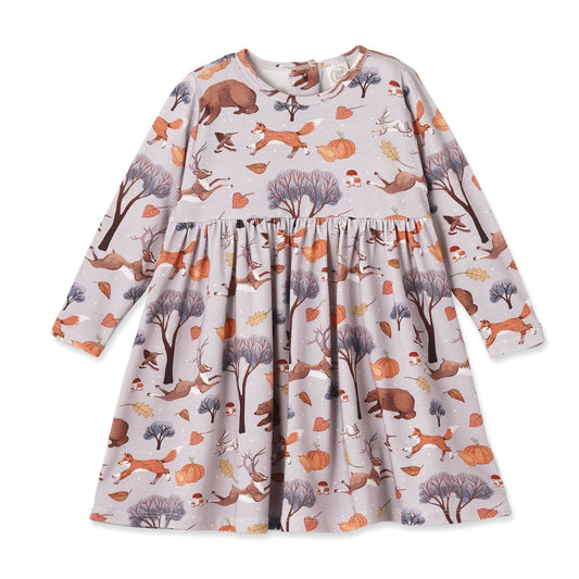 Children's dress with forest animal print on a white background