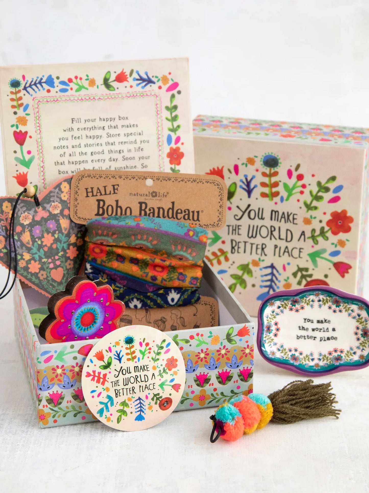 Collection of bohemian-themed products including a half-boho bandeau, car air freshener, and decorative items on a white background.