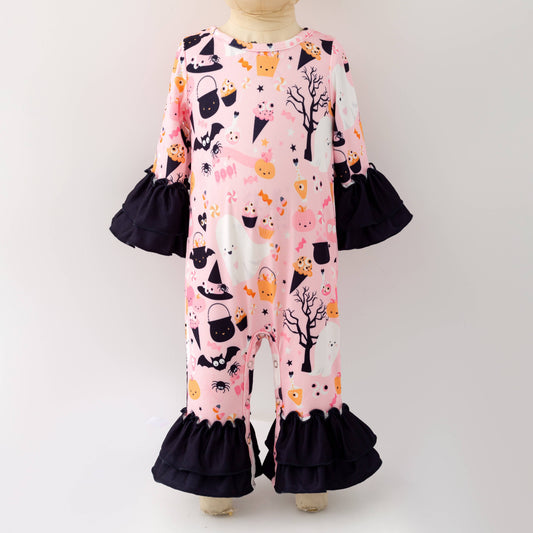 Children's outfit with pink and black pattern on a white background
