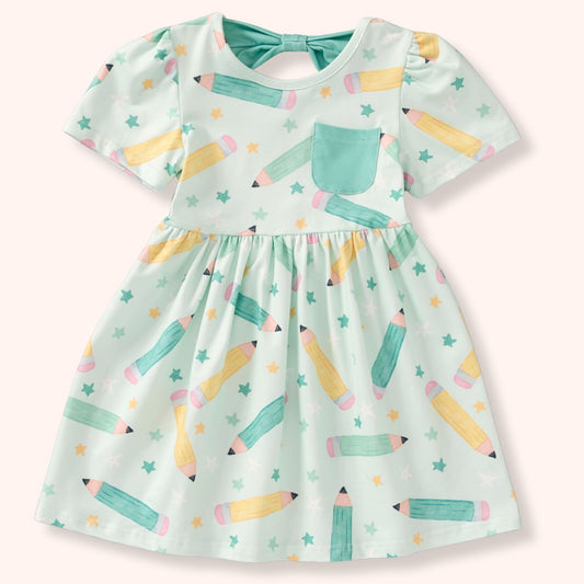 Children's dress with pencil pattern on a white background