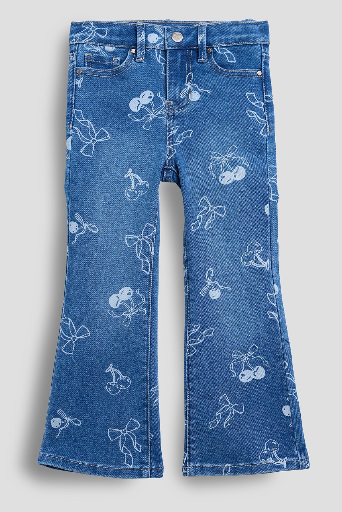 Blue jeans with white floral patterns on a light gray background