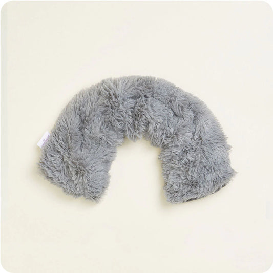 Gray fluffy neck pillow on a white background