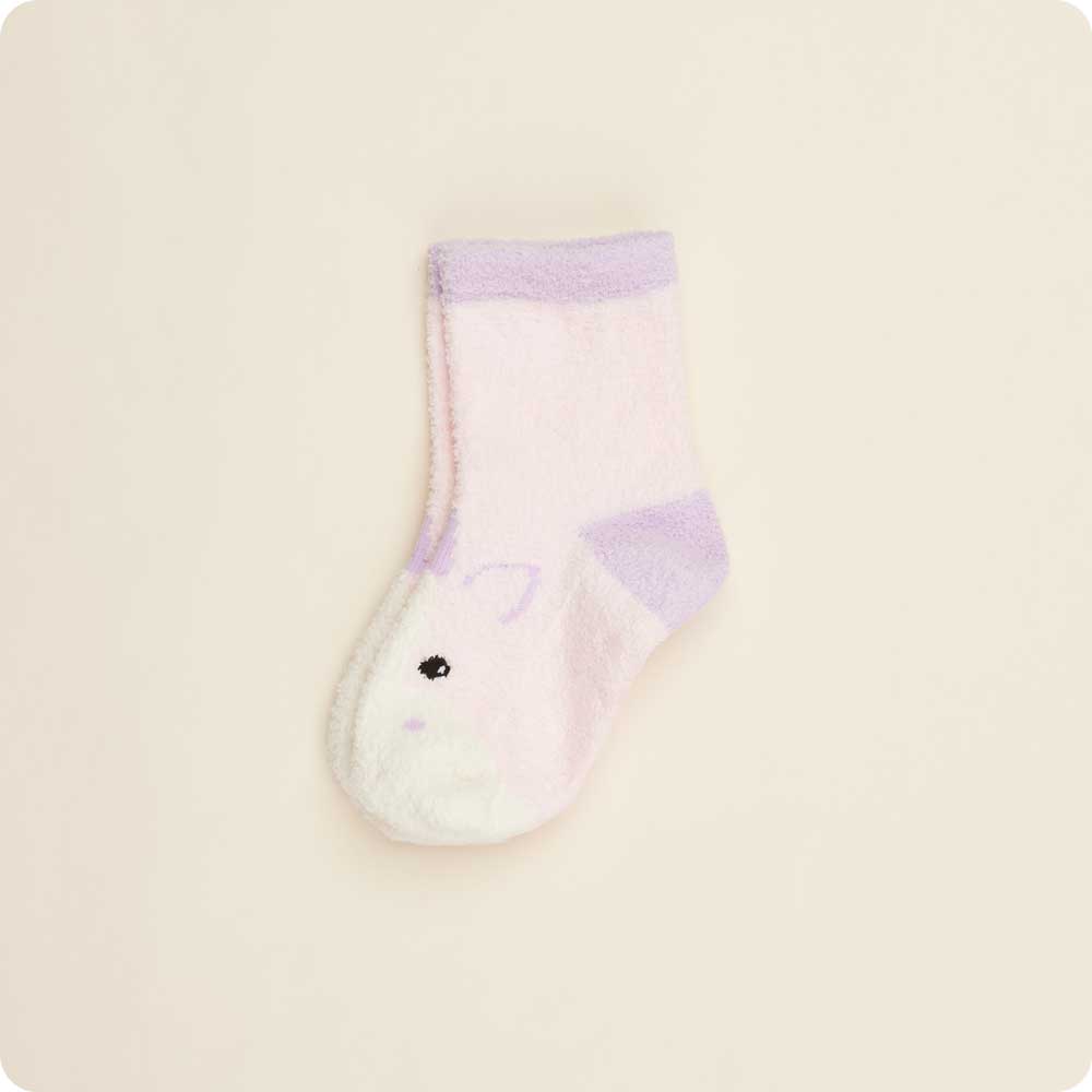 Baby sock with a small animal design on a beige background